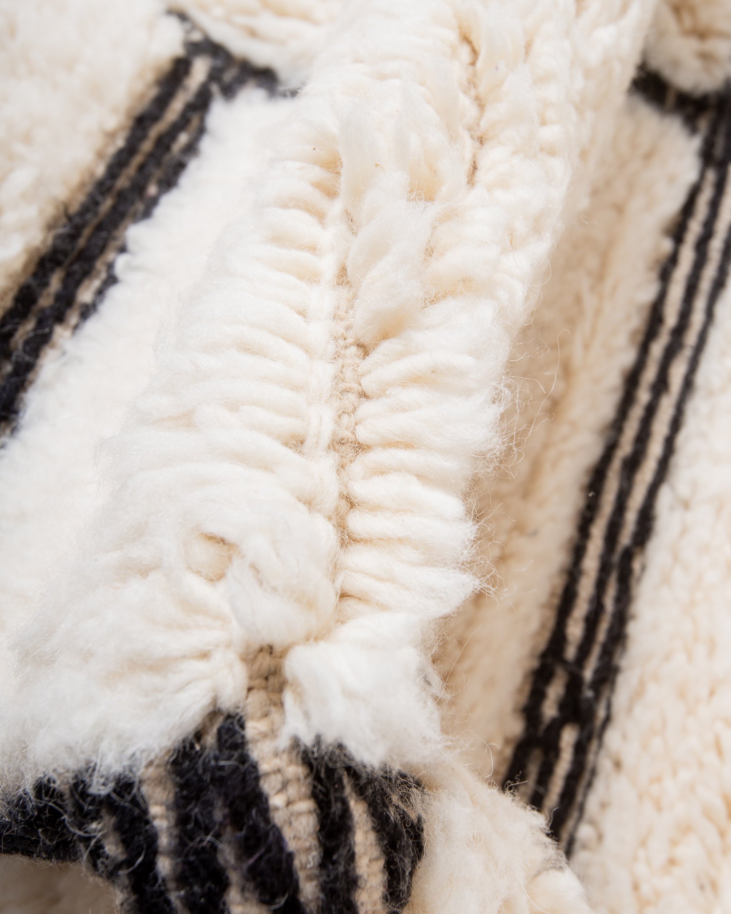 Modern, designer, handcrafted Berber rug from Morocco. Beniourain carpet with beautiful colours and patterns and fluffy wool texture.